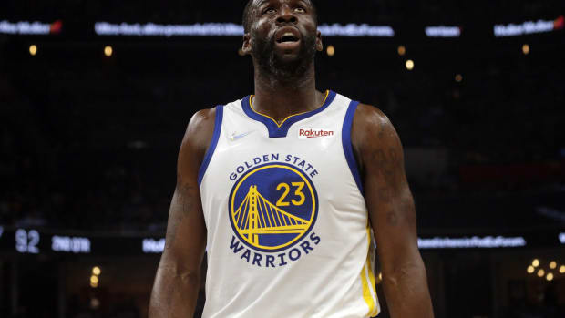 May 3, 2022; Memphis, Tennessee, USA; Golden State Warriors forward Draymond Green (23) looks up at the Jumbotron after a foul call during the first half in game two of the second round for the 2022 NBA playoffs against the Memphis Grizzlies at FedExForum. Mandatory Credit: Petre Thomas-USA TODAY Sports