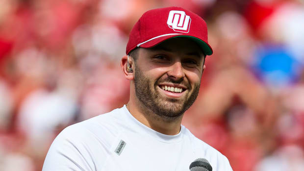 Oklahoma Sooners former player Baker Mayfield speaks to the crowd as his statue is unveiled during the spring game at Gaylord Family Oklahoma Memorial Stadium.