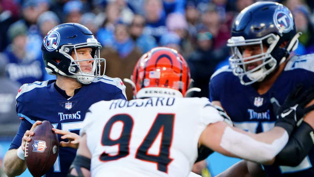 Tennessee Titans quarterback Ryan Tannehill (17) throws under pressure in the first quarter during an NFL divisional playoff football game against the Cincinnati Bengals, Saturday, Jan. 22, 2022, at Nissan Stadium in Nashville. Cincinnati Bengals At Tennessee Titans Jan 22 Afc Divisional Playoffs