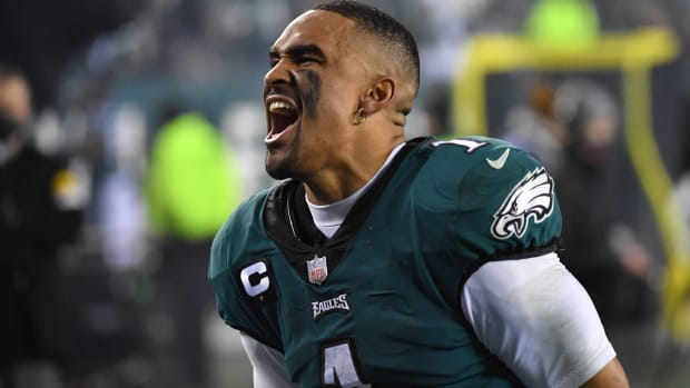 Jalen Hurts screams in celebration for the Eagles.