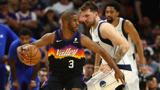 Phoenix Suns guard Chris Paul (3) moves the ball against Dallas Mavericks guard Luka Doncic (77) during the second half in game two of the second round for the 2022 NBA playoffs.