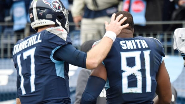 Tennessee Titans quarterback Ryan Tannehill (17) and tight end Jonnu Smith (81) celebrate the touchdown during the first quarter at Nissan Stadium Sunday, Dec. 22, 2019 in Nashville, Tenn.