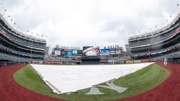 Mar 31, 2019; Bronx, NY, USA; A tarp covers the infield during a rain delay before a game between the New York Yankees and the Baltimore Orioles at Yankee Stadium. Mandatory Credit: Vincent Carchietta-USA TODAY Sports