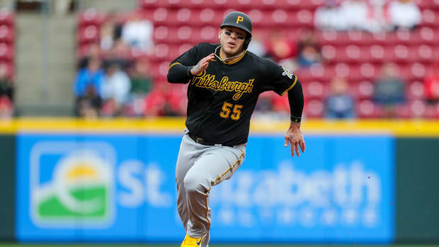 May 7, 2022; Cincinnati, Ohio, USA; Pittsburgh Pirates catcher Roberto Perez (55) runs the bases after a hit by right fielder Ben Gamel (not pictured) in the third inning against the Cincinnati Reds at Great American Ball Park.