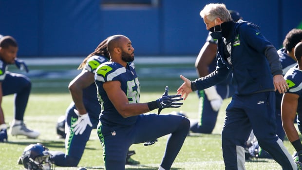 KJ Wright and Pete Carroll with the Seahawks.