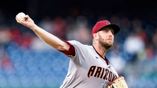 Arizona Diamondbacks starting pitcher Merrill Kelly throws during the first inning of the team’s baseball game against the Washington Nationals at Nationals Park, Wednesday, April 20, 2022, in Washington.