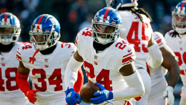 Jan 2, 2022; Chicago, Illinois, USA; New York Giants cornerback James Bradberry (24) reacts after intercepting a pass against the Chicago Bears during the second half at Soldier Field.