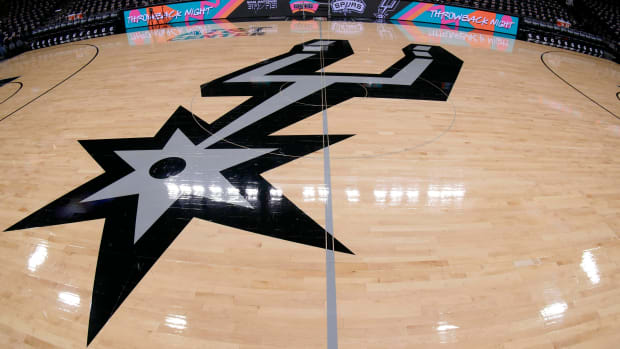 A general view of the San Antonio Spurs logo on the court.