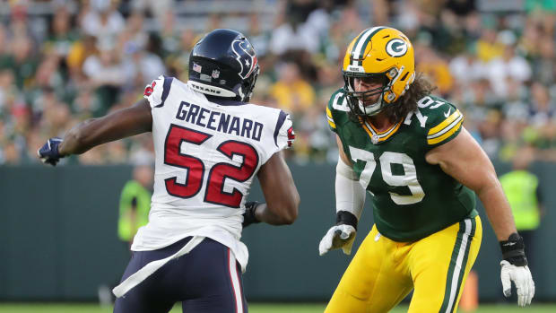 Green Bay Packers tackle Dennis Kelly (79) provides pass protection from Houston Texans defensive end Jonathan Greenard (52) during their preseason game Saturday, August 14, 2021 at Lambeau Field in Green Bay, Wis. The Houston Texans beat the Green Bay Packers 26-7. Mjs Kelly 22 Jpg Packers15