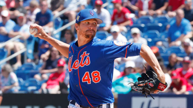 New York Mets starting pitcher Jacob deGrom (48) throws a pitch in the first inning during spring training.