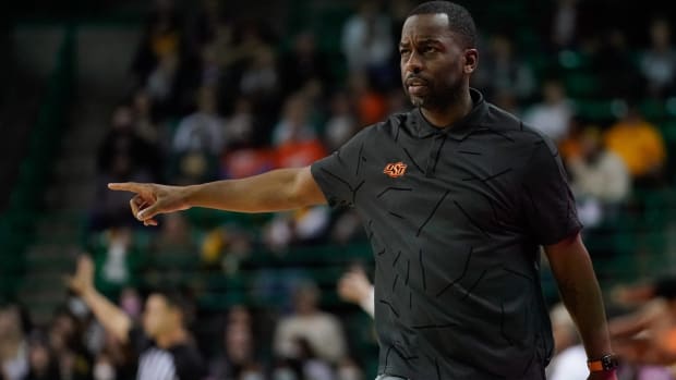 Mike Boynton on the sidelines for Oklahoma State.