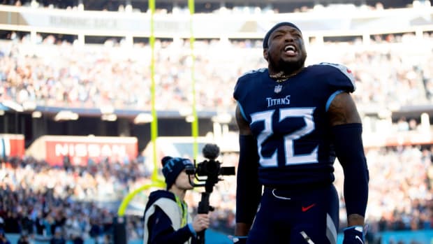 Tennessee Titans running back Derrick Henry (22) takes the field before an NFL divisional playoff football game, Saturday, Jan. 22, 2022, at Nissan Stadium in Nashville, Tenn. Cincinnati Bengals defeated Tennessee Titans 19-16.