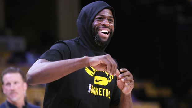 May 11, 2022; Memphis, Tennessee, USA; Golden State Warriors forward Draymond Green warms up before game five of the second round for the 2022 NBA playoffs against the Memphis Grizzlies at FedExForum. Mandatory Credit: Joe Rondone-USA TODAY Sports