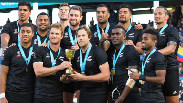 New Zealand poses with the champions trophy in the men’s championship final of the Rugby World Cup Sevens 2018.
