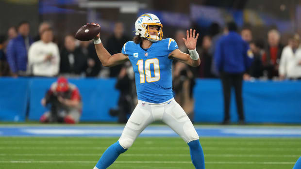 Dec 16, 2021; Inglewood, California, USA; Los Angeles Chargers quarterback Justin Herbert (10) throws a pass against the Kansas City Chiefs in the first half at SoFi Stadium. Mandatory Credit: Kirby Lee-USA TODAY Sports