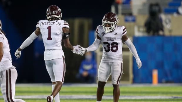 Oct 10, 2020; Lexington, Kentucky, USA; Mississippi State Bulldogs cornerback Martin Emerson (1) celebrates with safety Fred Peters (38) after an incomplete pass against the Kentucky Wildcats in the second half at Kroger Field. Mandatory Credit: Katie Stratman-USA TODAY Sports