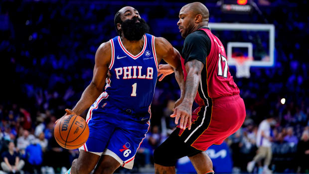 Philadelphia 76ers’ James Harden (1) drives past Miami Heat’s P.J. Tucker during the second half of Game 6 of an NBA basketball second-round playoff series.