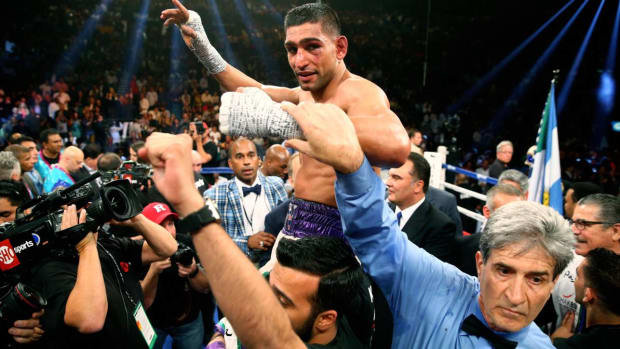 May 3, 2014; Las Vegas, NV, USA; Amir Khan celebrates after defeating Luis Collazo (not pictured) during their fight at MGM Grand. Mandatory Credit: Mark J. Rebilas-USA TODAY Sports