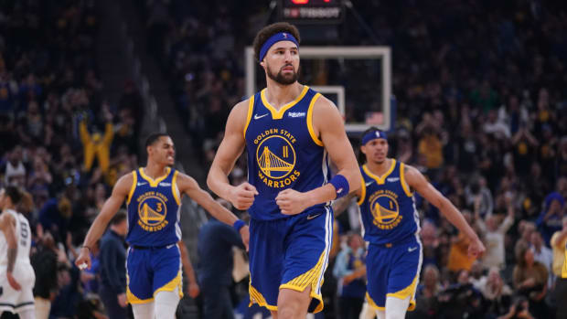 May 13, 2022; San Francisco, California, USA; Golden State Warriors guard Klay Thompson (11) reacts after making a three point basket against the Memphis Grizzlies in the second quarter during game six of the second round for the 2022 NBA playoffs at Chase Center. Mandatory Credit: Cary Edmondson-USA TODAY Sports