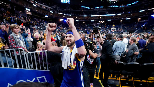 ay 13, 2022; San Francisco, California, USA; Golden State Warriors guard Klay Thompson (11) walks towards the locker room after the Warriors defeated the Memphis Grizzlies in game six of the second round for the 2022 NBA playoffs at Chase Center. Mandatory Credit: Cary Edmondson-USA TODAY Sports