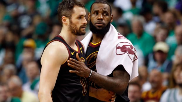 May 23, 2018; Boston, MA, USA; Cleveland Cavaliers center Kevin Love (0) and forward LeBron James (23) talk during the second quarter of game five against the Boston Celtics in the Eastern conference finals of the 2018 NBA Playoffs at TD Garden. Mandatory Credit: Winslow Townson-USA TODAY Sports