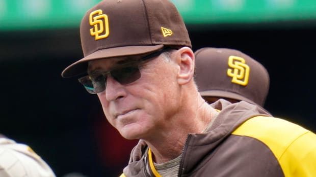 FILE - San Diego Padres manager Bob Melvin stands in the dugout during the first inning of a baseball game against the Pittsburgh Pirates in Pittsburgh, May 1, 2022. Melvin says he’ll have prostate surgery on Wednesday, May 11, 2022, and hopes he misses only part of a forthcoming road trip. He doesn’t think he has cancer “but they won’t know until they get in there.” (AP Photo/Gene J. Puskar, File)