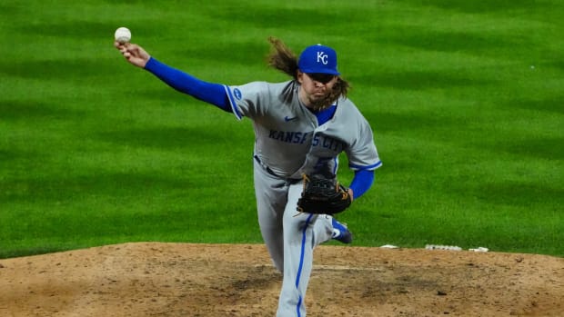May 13, 2022; Denver, Colorado, USA; Kansas City Royals relief pitcher Scott Barlow (58) delivers a pitch in the ninth inning against the Colorado Rockies at Coors Field. Mandatory Credit: Ron Chenoy-USA TODAY Sports