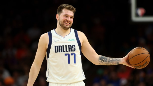 May 15, 2022; Phoenix, Arizona, USA; Dallas Mavericks guard Luka Doncic (77) reacts against the Phoenix Suns in game seven of the second round for the 2022 NBA playoffs at Footprint Center.