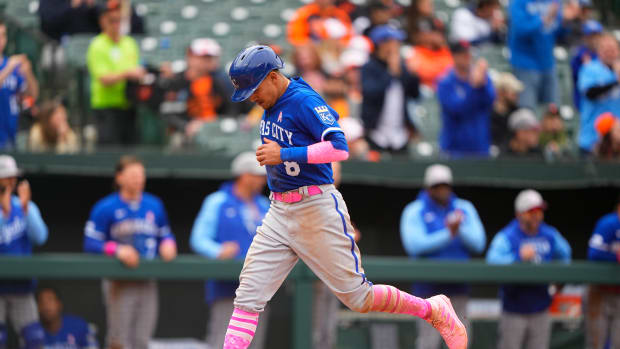 May 8, 2022; Baltimore, Maryland, USA; Kansas City Royals shortstop Nicky Lopez (8) scores a run on Kansas City Royals Michael A. Taylor (2) (not pictured) RBI single against the Baltimore Orioles during the first inning at Oriole Park at Camden Yards. Mandatory Credit: Gregory Fisher-USA TODAY Sports