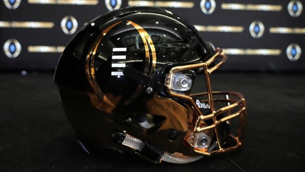 A detailed view of College Football Playoff National Championship logo helmet.