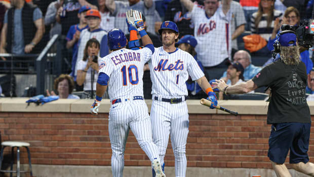 The Mets settled for a split in their doubleheader with the Cardinals on Tuesday.