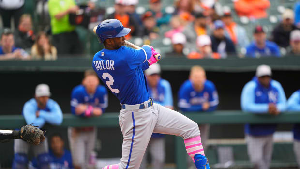 May 8, 2022; Baltimore, Maryland, USA; Kansas City Royals Michael A. Taylor (2) hits an RBI single against the Baltimore Orioles during the ninth inning at Oriole Park at Camden Yards. Mandatory Credit: Gregory Fisher-USA TODAY Sports