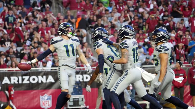 Seattle Seahawks wide receiver Cody Thompson (11) celebrates after recovering a loose ball against the Arizona Cardinals during the second half at State Farm Stadium.