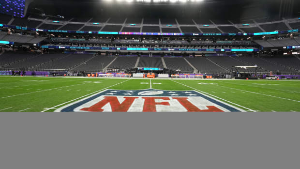 The NFL shield logo.