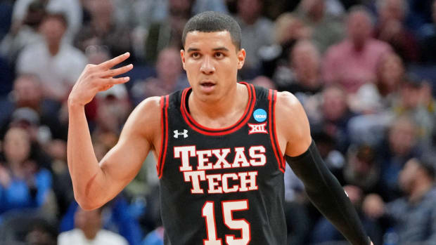 Texas Tech Red Raiders guard Kevin McCullar (15) reacts after a three point basket.