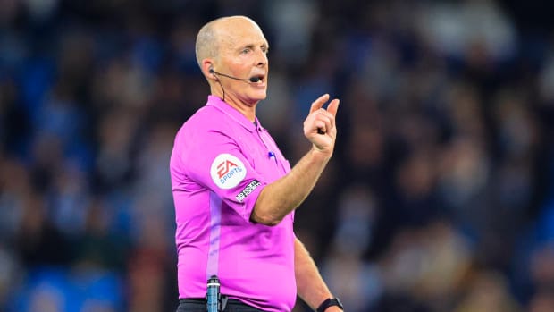 Referee Mike Dean pictured during the Premier League game between Manchester City and Brighton in April 2022