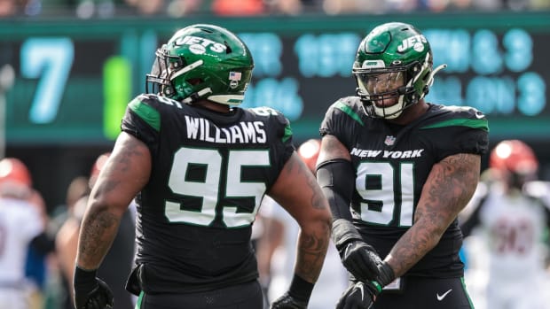 New York Jets DL John Franklin-Myers and Quinnen Williams celebrate sack