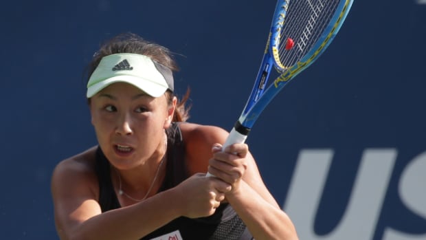 Shuai Peng of China returns a shot at the 2019 US Open.