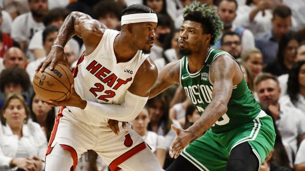 Boston Celtics guard Marcus Smart (36) defends Miami Heat forward Jimmy Butler