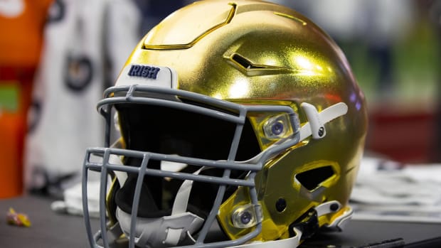 A Notre Dame Fighting Irish gold helmet