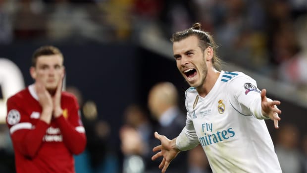 Gareth Bale pictured (right) celebrating a goal during Real Madrid's 3-1 win over Liverpool in the 2018 Champions League final