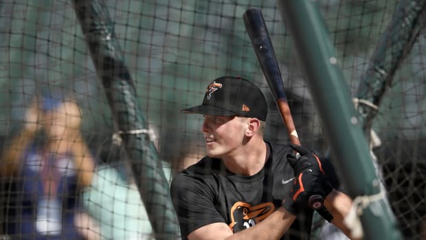 In this June 25, 2019, file photo, Baltimore Orioles first-round draft pick Adley Rutschman takes batting practice before a baseball game against the San Diego Padres in Baltimore. The Orioles called Rutschman up to the majors Saturday, May 21, 2022, paving the way for the 24-year-old catcher to make his big league debut.