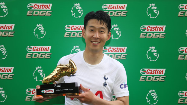 Son Heung-min pictured holding the Golden Boot trophy after ending the 2021/22 season as the joint top scorer in the Premier League