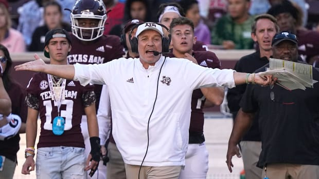 Jimbo Fisher throws his hands up on the sideline