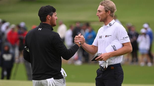 Mito Pereira and Will Zalatoris embrace after the third round of the PGA Championship/