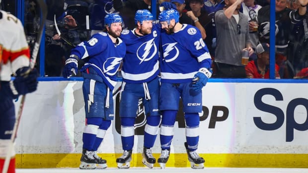 Lightning center Steven Stamkos (91) (center) celebrates after scoring a goal against the Panthers in the second period in game three.
