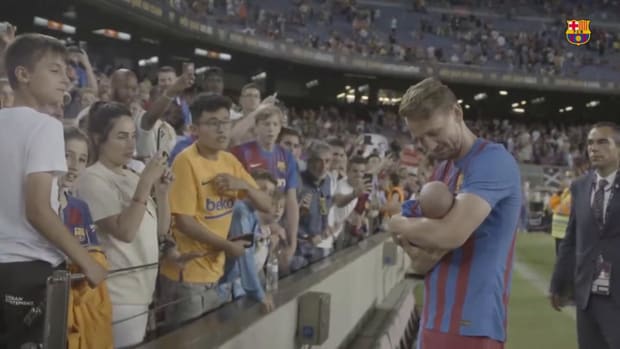 Luuk de Jong's lovely moment with his baby as the Camp Nou applaud him