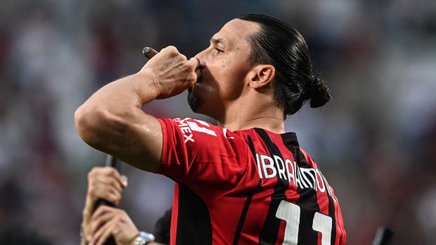 Zlatan Ibrahimovic pictured puffing on a cigar after AC Milan were crowned as Serie A champions in May 2022
