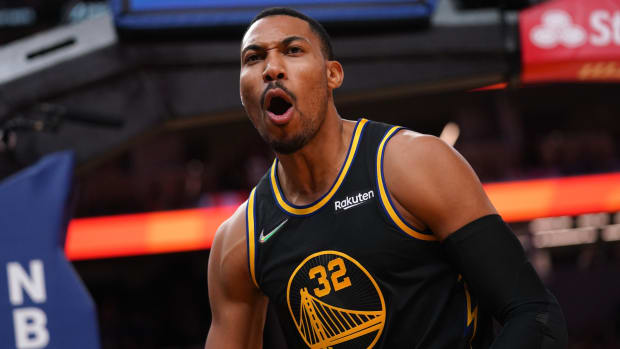 Warriors forward Otto Porter Jr. (32) reacts after the Nuggets were called for an offensive foul in the fourth quarter of a game.