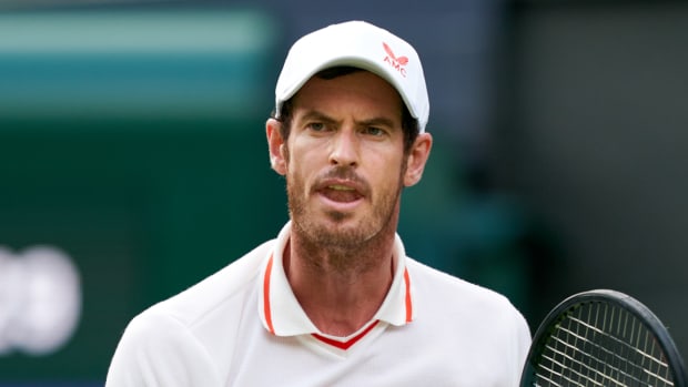 Andy Murray (GBR) reacts to a point on the Centre Court in the first round at Wimbledon 2021.